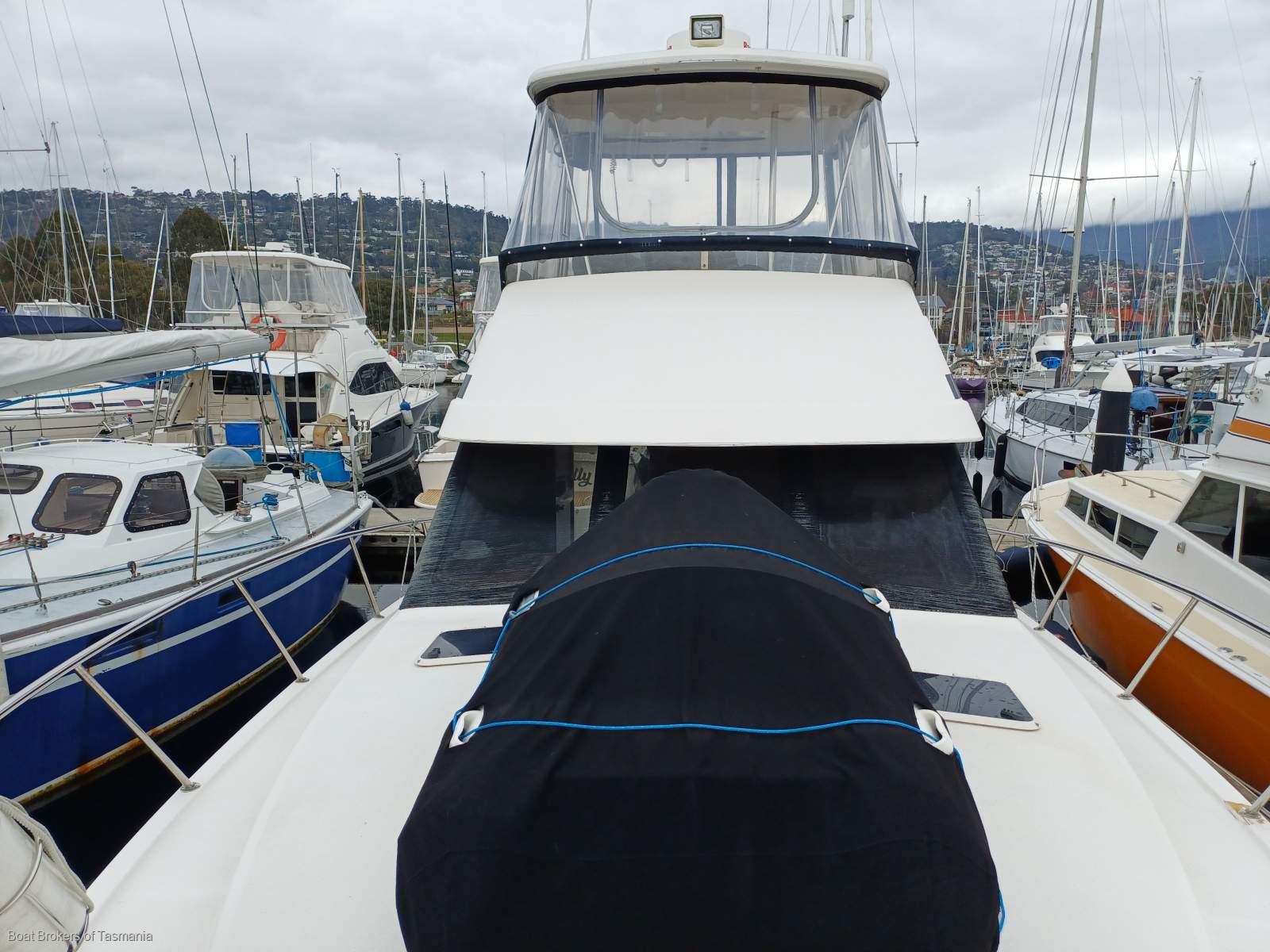Less Stress Riviera 36 Flybridge. Twin cabins, twin Cummins. Boat Brokers of Tasmania