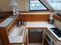 Riviera 36 Flybridge. Twin cabins, twin Cummins.