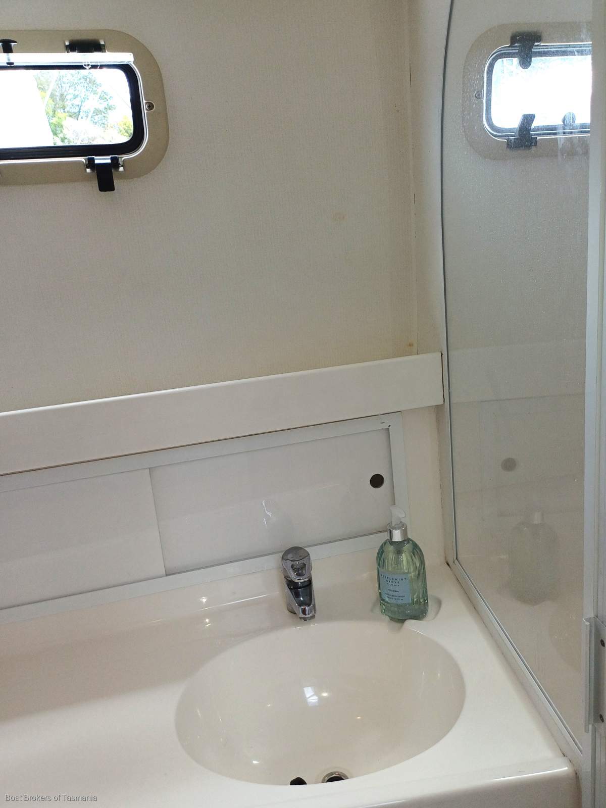 Waste Knot Caribbean 35 Flybridge Cruiser with a generator and bowthruster Boat Brokers of Tasmania