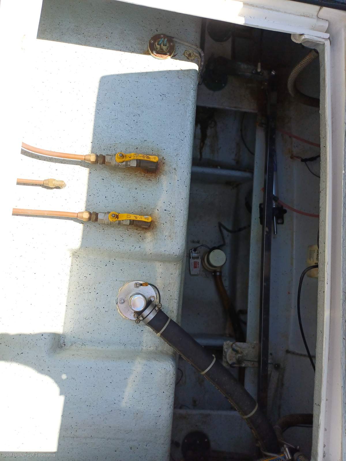 Waste Knot Caribbean 35 Flybridge Cruiser with a generator and bowthruster Boat Brokers of Tasmania