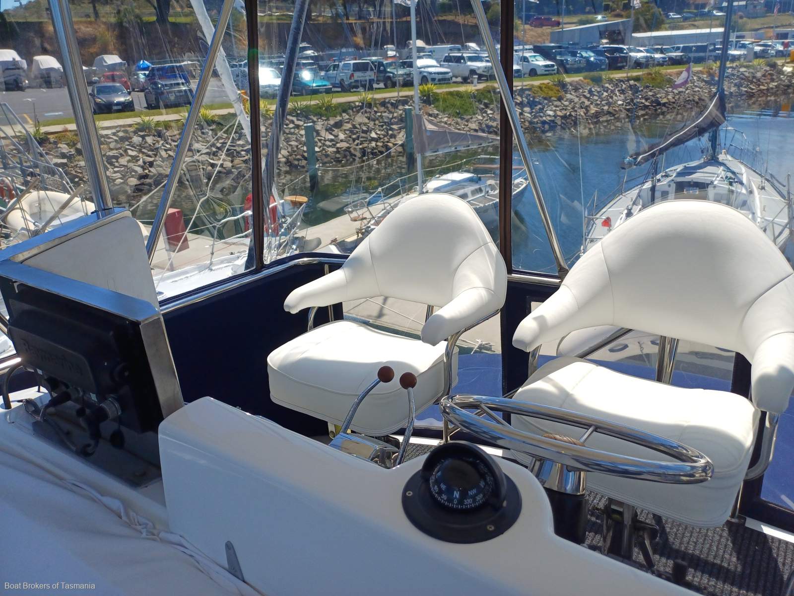 Waste Knot Caribbean 35 Flybridge Cruiser with a generator and bowthruster Boat Brokers of Tasmania