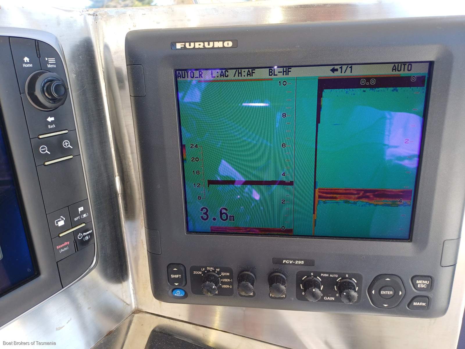 Waste Knot Caribbean 35 Flybridge Cruiser with a generator and bowthruster Boat Brokers of Tasmania