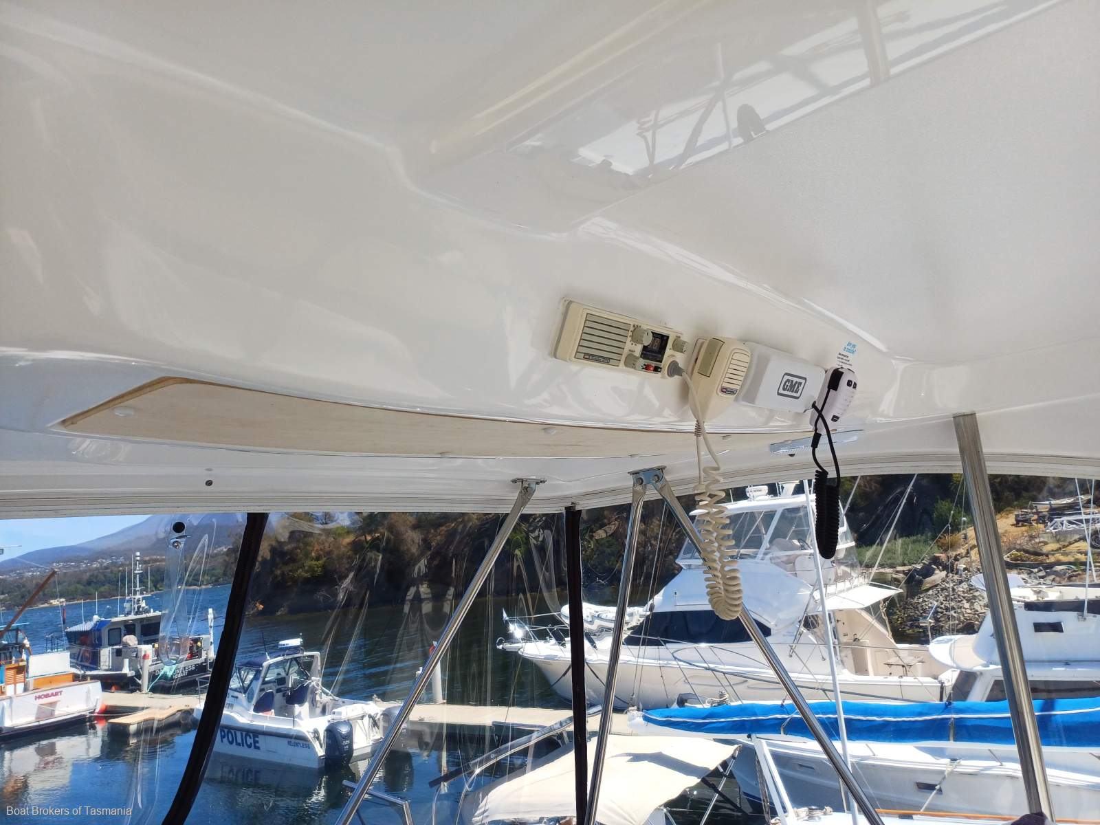 Waste Knot Caribbean 35 Flybridge Cruiser with a generator and bowthruster Boat Brokers of Tasmania