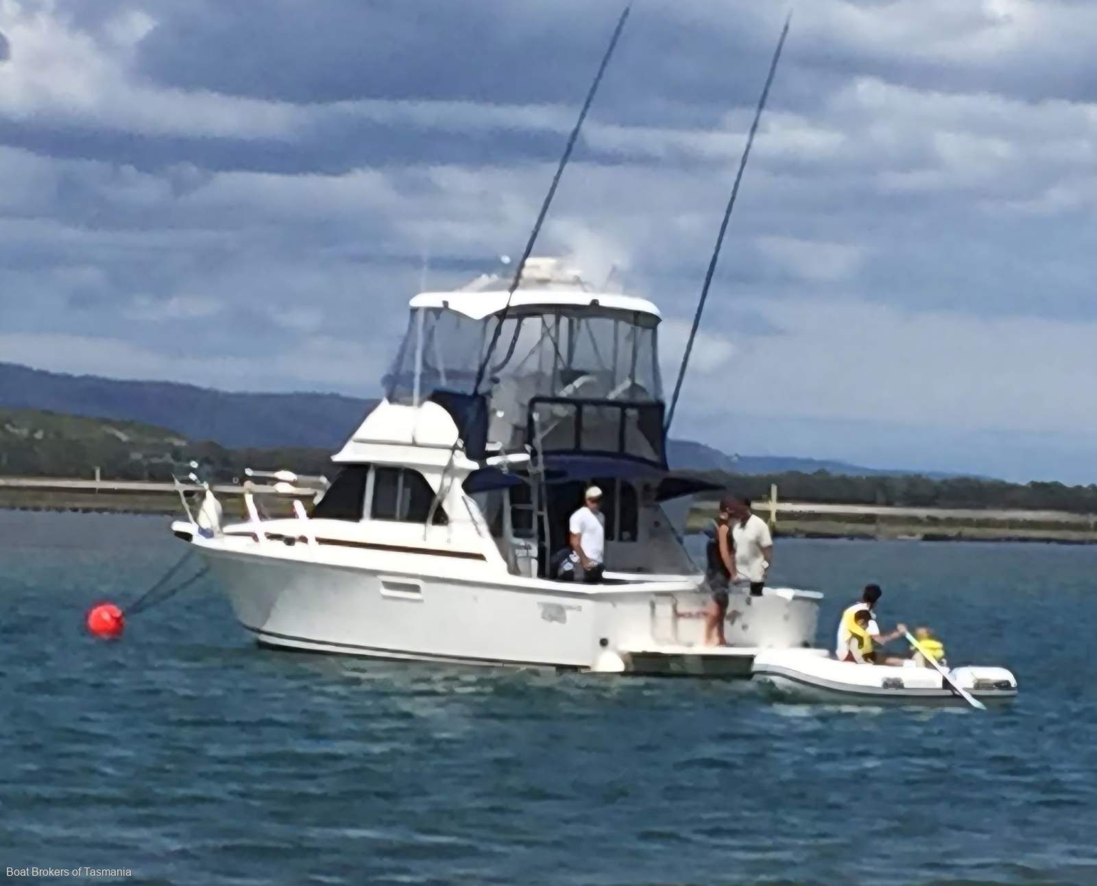 Waste Knot Caribbean 35 Flybridge Cruiser with a generator and bowthruster Boat Brokers of Tasmania