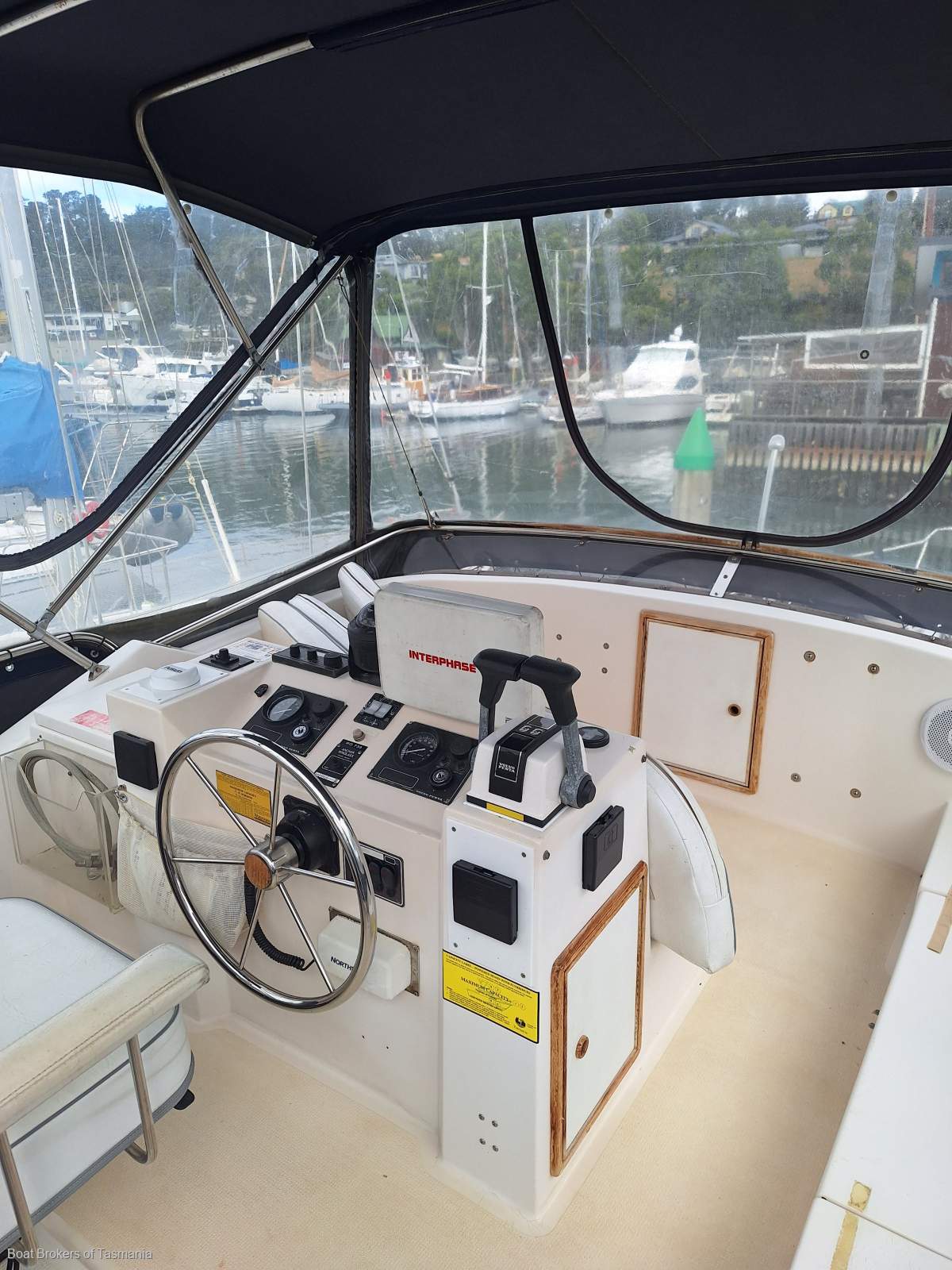 Enchantress Riviera 34 Flybridge Cruiser Shaft drive diesels, bowthruster and a lot more. Boat Brokers of Tasmania