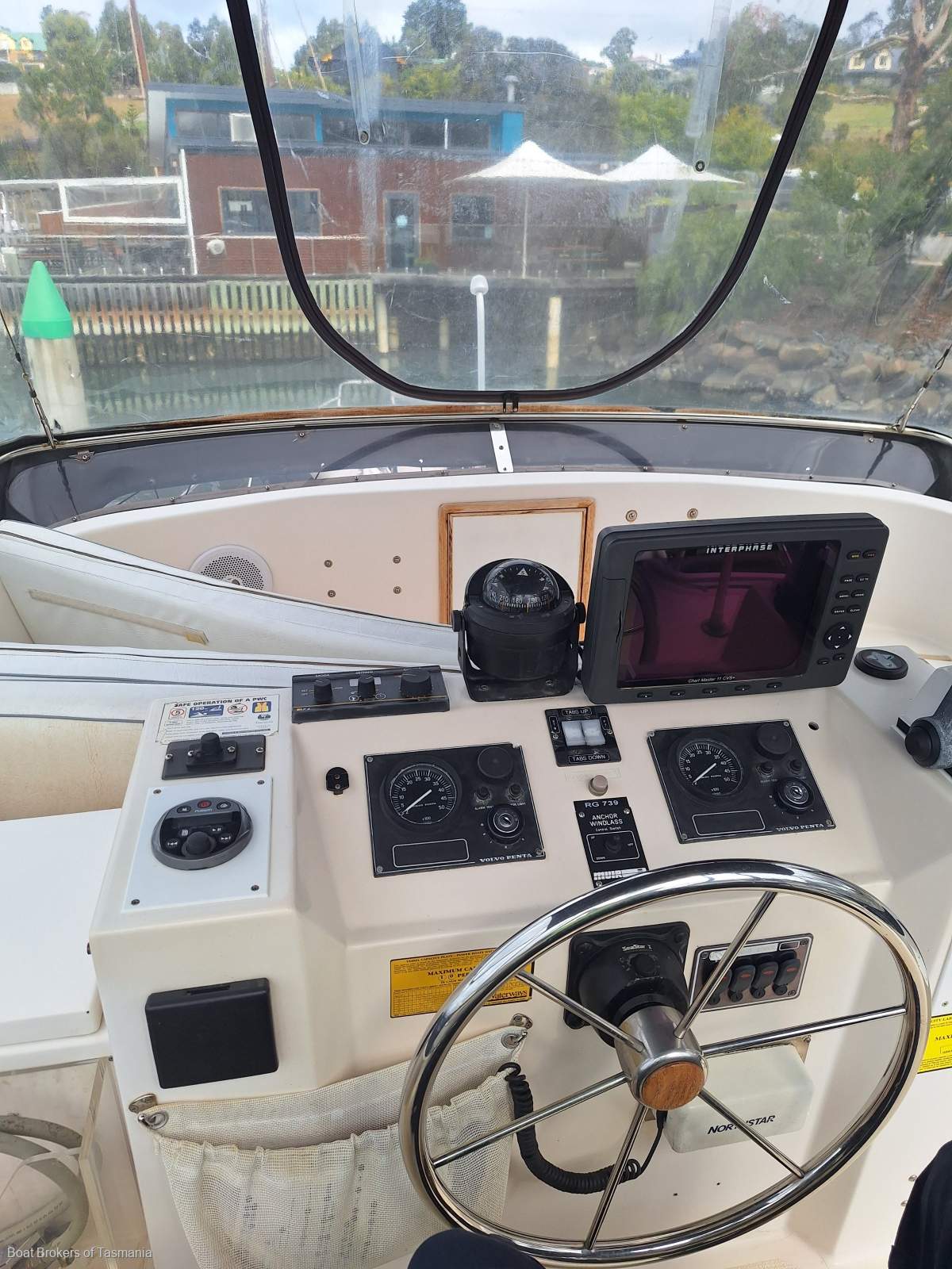 Enchantress Riviera 34 Flybridge Cruiser Shaft drive diesels, bowthruster and a lot more. Boat Brokers of Tasmania