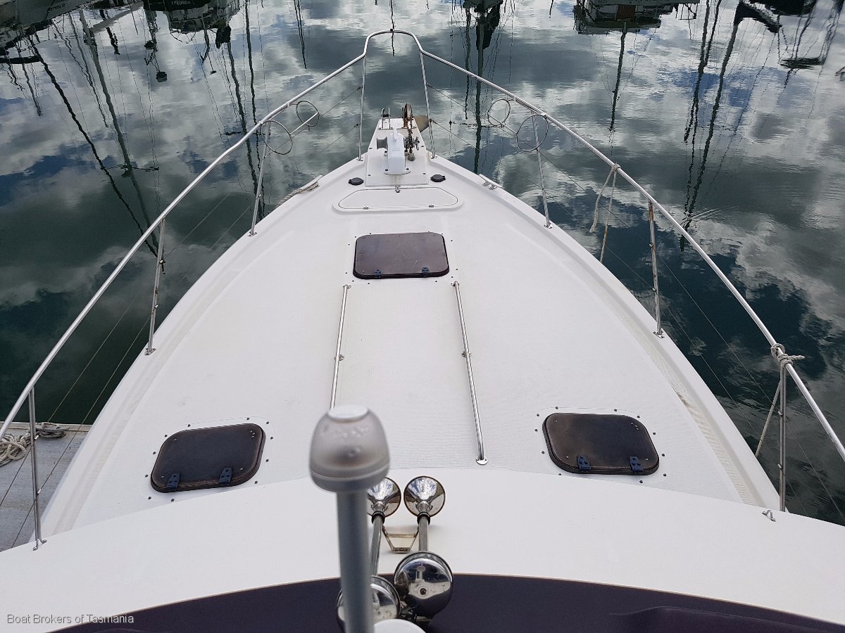 Enchantress Riviera 34 Flybridge Cruiser Shaft drive diesels, bowthruster and a lot more. Boat Brokers of Tasmania