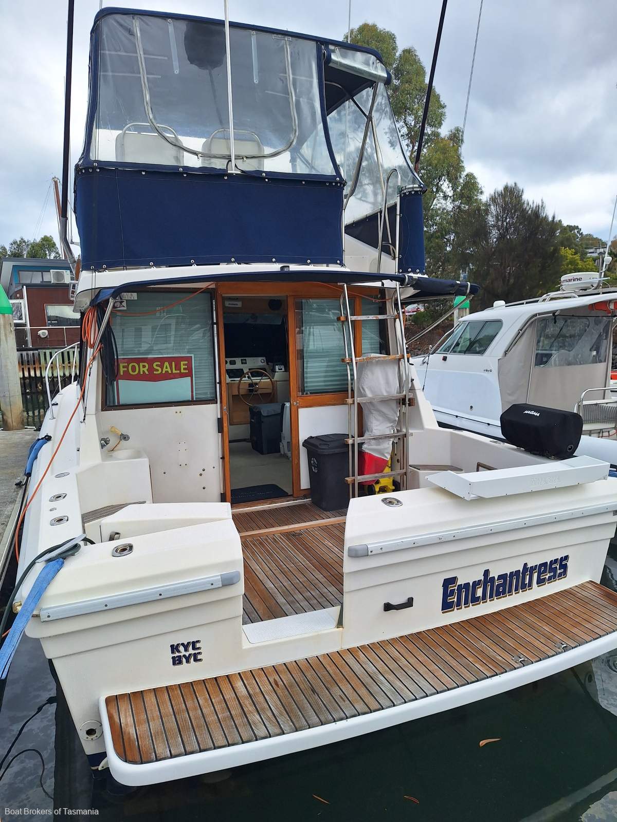Enchantress Riviera 34 Flybridge Cruiser Shaft drive diesels, bowthruster and a lot more. Boat Brokers of Tasmania