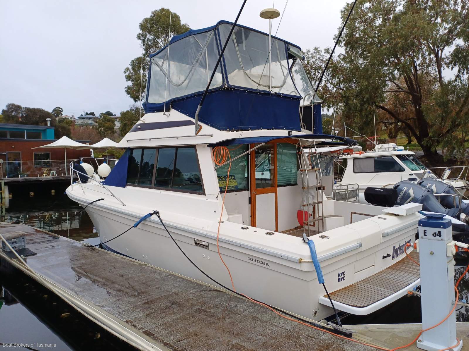 Enchantress Riviera 34 Flybridge Cruiser Shaft drive diesels, bowthruster and a lot more. Boat Brokers of Tasmania