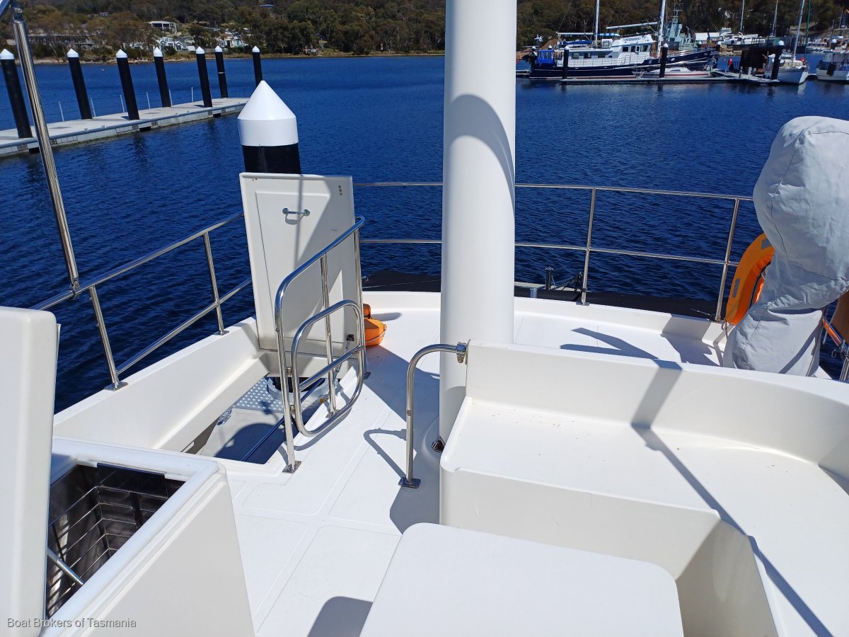 Last Word Alaska 45 Flybridge 3 cabins, 2 heads, Cummins diesels. Boat Brokers of Tasmania