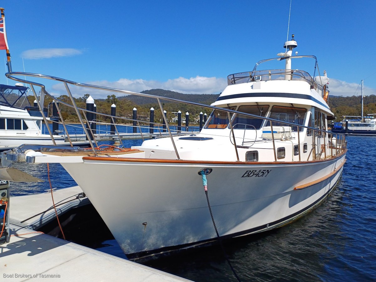 Last Word Alaska 45 Flybridge 3 cabins, 2 heads, Cummins diesels. Boat Brokers of Tasmania