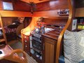 Boden Classic 50 foot Timber Yacht:Looking Forward from the Saloon to chart table and pipe berths