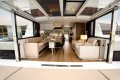 New Bali Catamarans 4.4 1/8 Share Whitsundays June 2023:Saloon showing tilting door and door to the bow
