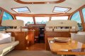 Palm Beach Motor Yachts 55 Express with Bow rider:Saloon twin helm seats