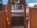 Palm Beach Motor Yachts 50 Twin Cabin - Yanmar shaft drive - Galley up:Companion way to Guest and Master cabin