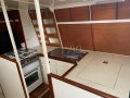 Alan Payne Custom Designed Centreboard Yacht:Galley with full stove