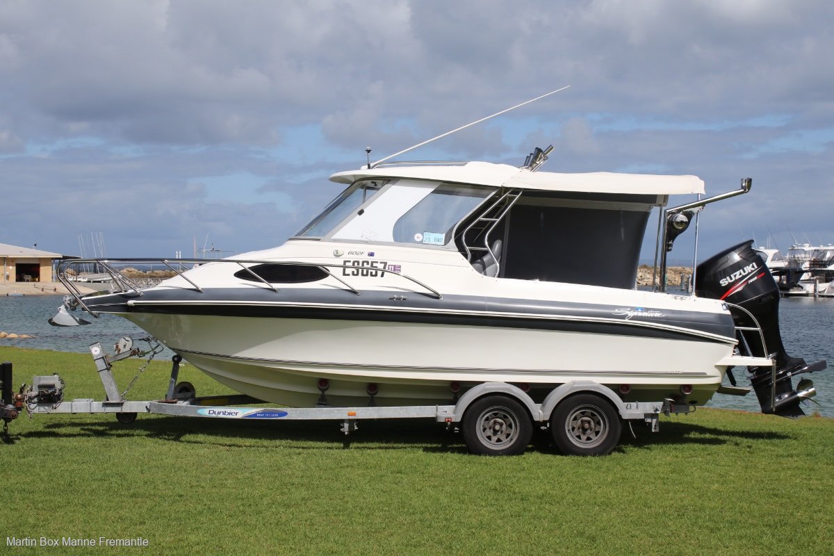 Haines Signature 602F with only 380 hours For Sale Martin Box Marine
