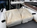 Protector 310 Chase " BOATHOUSE STORAGE ":Rear seat with covers on