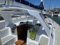 Lavranos 41 Fast Liveaboard Cruiser with racing potential:Hardtop dodger with polycarbonate windows fitted with solar panels