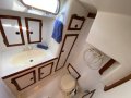 Lavranos 41 Fast Liveaboard Cruiser with racing potential:Generous sized head with overhead shower, vanity and wet locker.