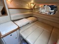 Sea Ray 330 Sundancer "Repowered and Shaft Drive":Mid Ship Lounge as Bed