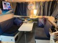 Bruce Harris Houseboat:Dinette which converts to 2 additional berths