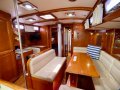 Little Harbor 50 -Elegance & Performance in a World Cruising Yacht:Folding dining table (access to engine under island seat)