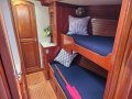 Little Harbor 50 -Elegance & Performance in a World Cruising Yacht:Starboard forward cabin with offset bunks and bedding