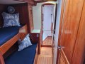 Little Harbor 50 -Elegance & Performance in a World Cruising Yacht:Port forward cabin with offset bunks and bedding