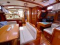 Little Harbor 50 -Elegance & Performance in a World Cruising Yacht:Saloon Oct 2022 looking aft (engine located under island seat)