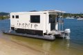 Expanding Trailerable Houseboat