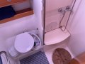 Bavaria Cruiser 42 - Exceptional value for liveaboard family cruising:Main head, new electric toilet / macerator with separate shower cubicle (midship)
