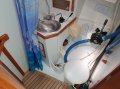 Adams 45 Cutter Sloop Centre Cockpit - A Capable, Safe & Strong Ocean Voyager:Forward head with lavac toilet and holding tank. Overhead shower and electric sump.
