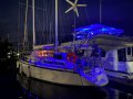 Amel 53 Super Maramu - The Ultimate Global Cruising Yacht:Pushpit mounted deck/cockpit lights (blue/white) - wind generator