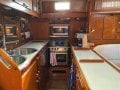 Amel 53 Super Maramu - Bluewater Cruising Without Compromise:Large secure galley with upgraded worktops, w/machine, d/washer, microwave, espresso maker