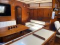 Amel 53 Super Maramu - The Ultimate Global Cruising Yacht:Pull-out single berth in saloon