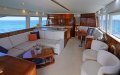 Riviera 58 Enclosed Flybridge Stunning four cabin three bathroom passagemaker:Cream leather lounges, gloss cherry cabinetry