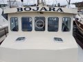 Custom steel trawler style coastal cruiser