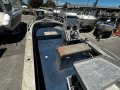 Coraline 460 Side Console with a 2016 model 75hp Etec