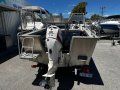 Coraline 460 Side Console with a 2016 model 75hp Etec
