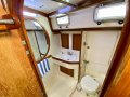 Bristol 38.8 -Adorable Bluewater Cruiser with Centreboard:Access to shower and toilet via forward cabin