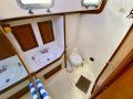 Bristol 38.8 -Adorable Bluewater Cruiser with Centreboard:Main head (port) looking forward with overhead shower hose