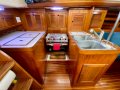 Bristol 38.8 -Adorable Bluewater Cruiser with Centreboard:U-shape galley with filtered fresh pressurised and foot pump water