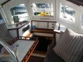 Hartley Fijian 43 With bowspit and davits overhang approx 49ft:Previous state.  Wheelhouse roofing structure now requiring rebuild