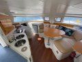 Fountaine Pajot Lavezzi 40 2008:Galley with twin sinks, fridge, stove and full oven