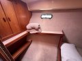 Riviera 34 Flybridge Cruiser " Dual Helm, Dual shaft Diesels ":Master cabin