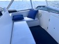 Riviera 34 Flybridge Cruiser " Dual Helm, Dual shaft Diesels ":Port Flybridge Seating