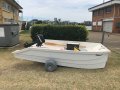Fastback 43 Custom:Dinghy with wheels on