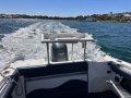 CruiseCraft Outsider 625 REPOWERED 2018 " BOAT HOUSE STORAGE and TRAILER ":Rear Seat folded away
