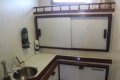 Boro Islander 44 Cutter Ketch with enclosed Wheel house:Bathroom cupboards